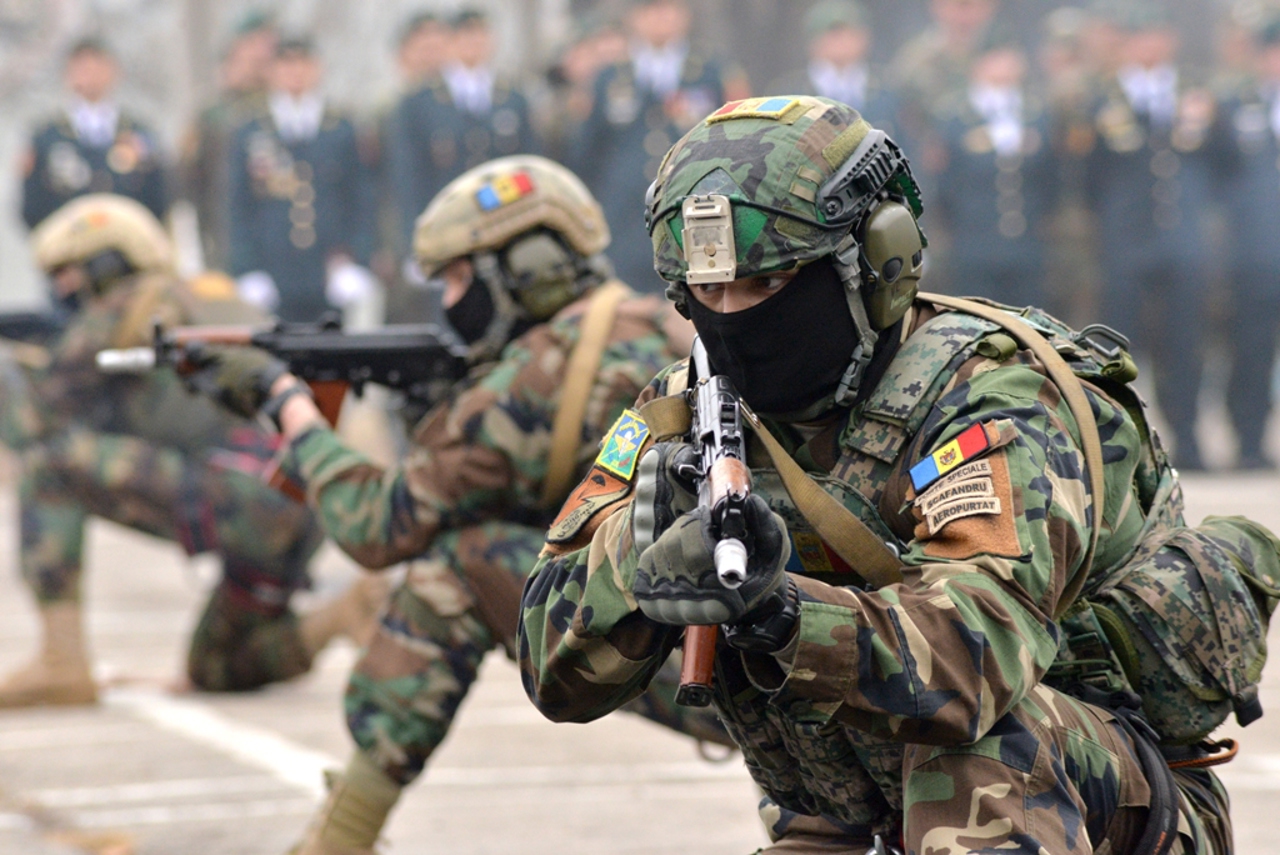 Soldiers of the National Army participate in a combat firing exercise