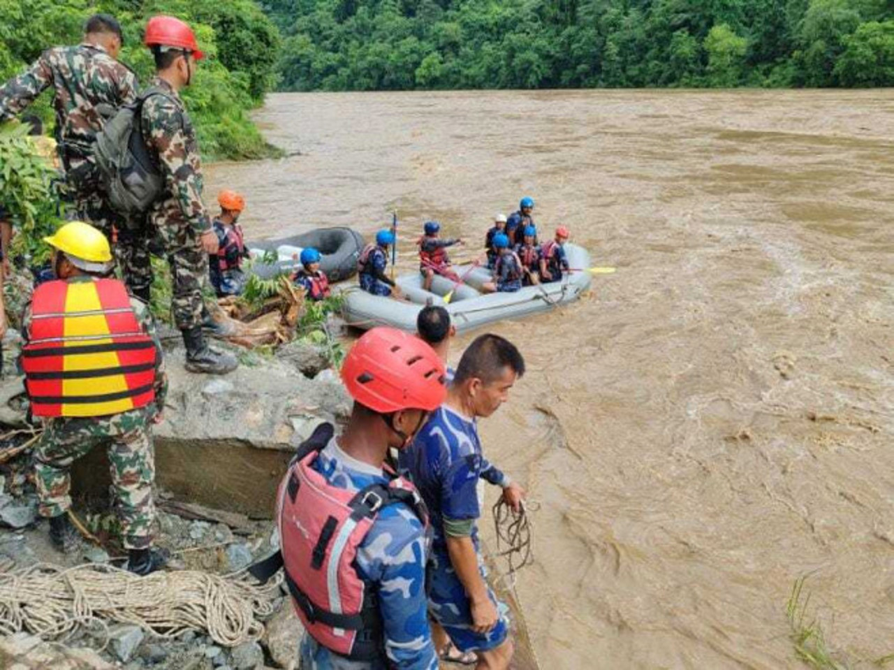 Dozens missing as landslide sweeps buses into river in Nepal