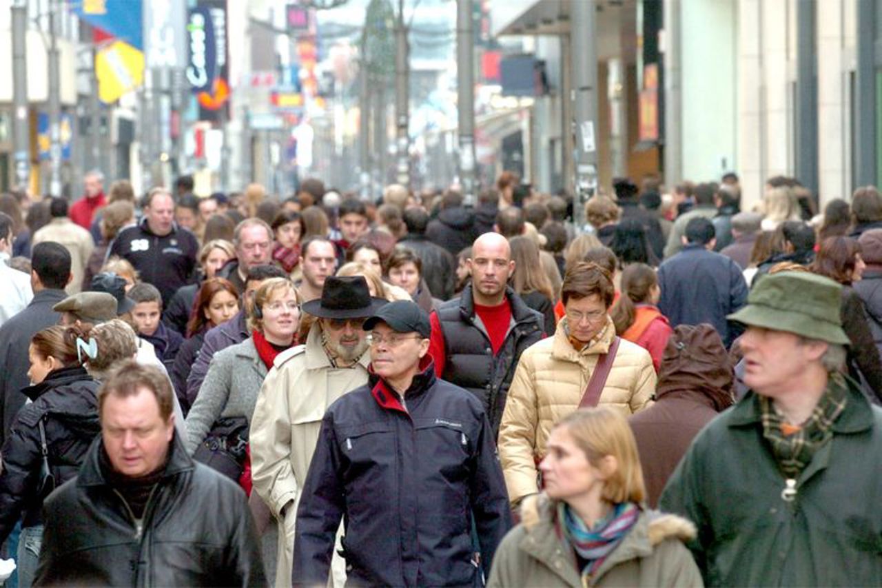 Belga / Oameni pe o stradă din Bruxelles