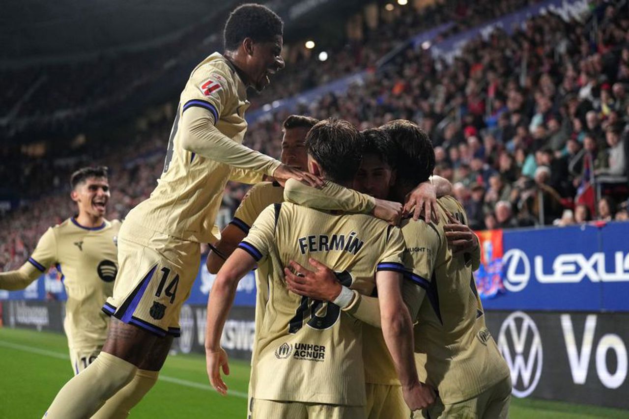 Barcelona secure 2-1 victory to pressure Real Madrid