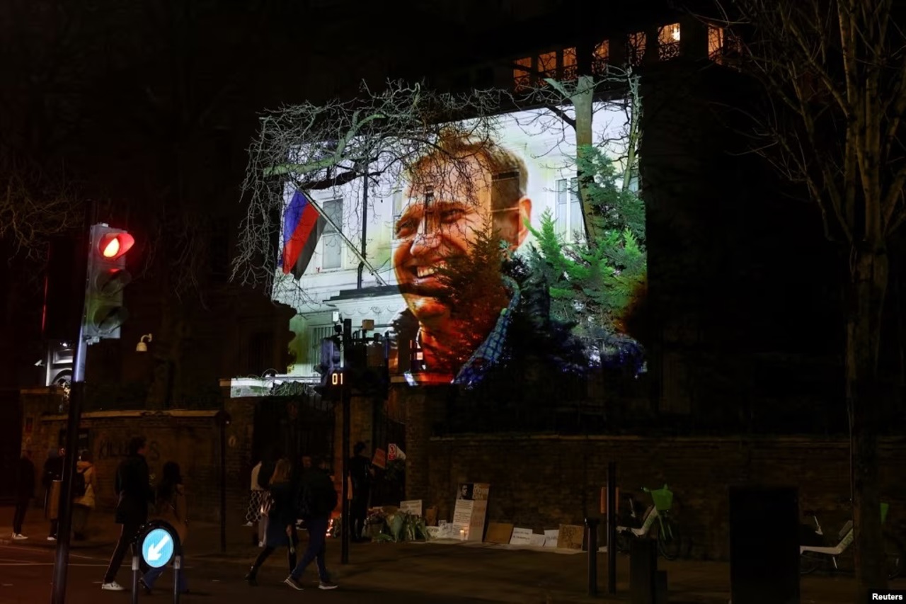 Image of Russian opposition leader Alexei Navalny projected on the Russian Embassy in London