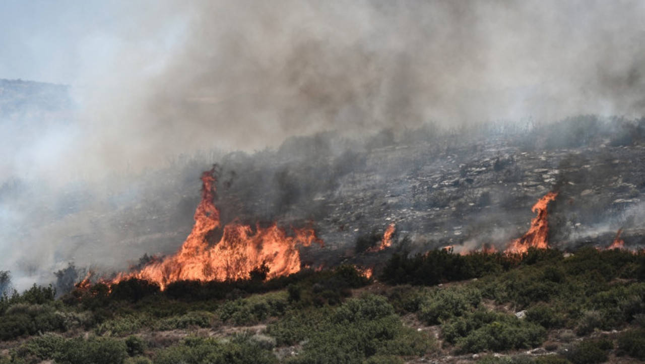 Wildfire in Greece triggers explosions at ammunition depot and relocation of fighter jets