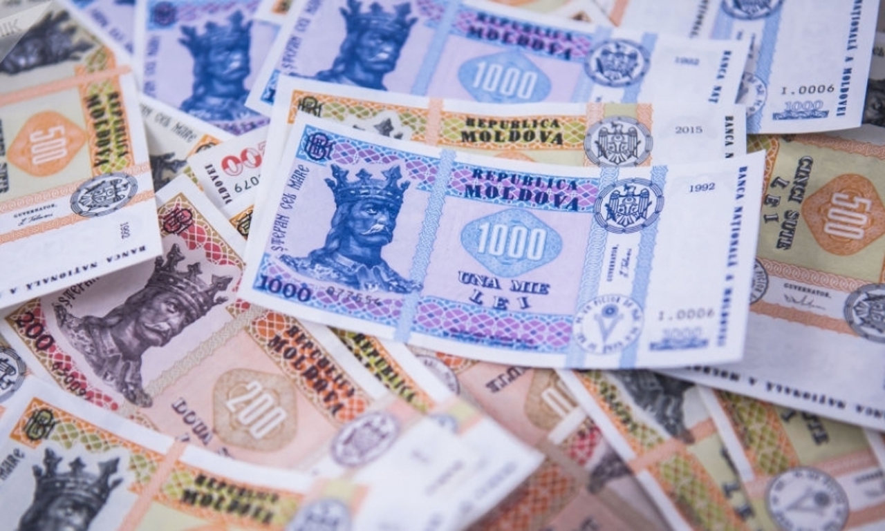 O fostă șefă de direcție din cadrul Primăriei Chișinău și un om de afaceri, reținuți pentru fapte de corupție 